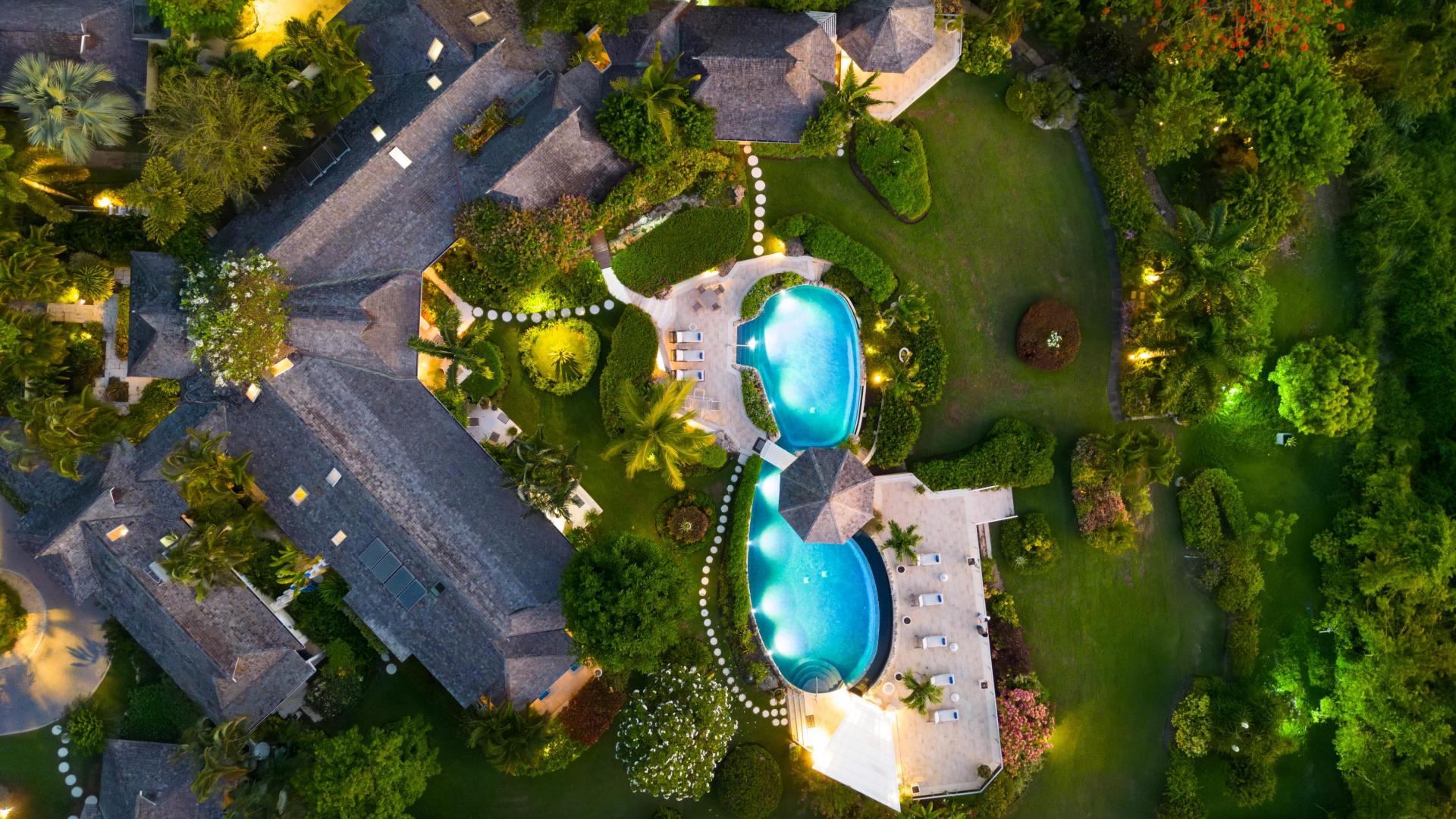 Point of View Holiday Rental In Sandy Lane Barbados Aerial View of Entire Property with Gardens at Dusk