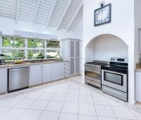 Point of View Holiday Rental In Sandy Lane Barbados Kitchen with Full Range and Adjacent Laundry Room