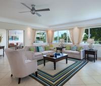 Palm Beach 204 Barbados Beachfront Condo Rental Living Room and TV