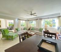 Palm Beach 211 Barbados Beachfront Vacation Condo Rental Cards Table and Living Room