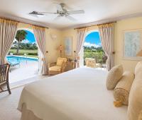Ground-floor bedroom with direct pool access, featuring a serene tropical ambiance at Benjoli Breeze, Barbados.