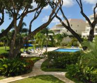 Palm Beach 211 Barbados Beachfront Vacation Condo Rental Gardens and Path To Pool
