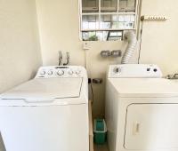 Heywoods 145 Barbados Vacation Rental Apartment Laundry Room with Washer and Dryer