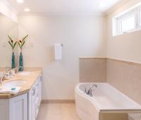 Beachfront Holiday Rental Barbados Palm Beach 410 Master Bathroom Tub and Vanity
