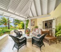 Point of View Holiday Rental In Sandy Lane Barbados TV Room covered Patio with Ocean and Garden Views