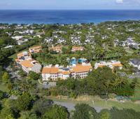 Panoramic view of Sugar Hill Resort, Barbados, highlighting the penthouse’s proximity to the west coast, lush landscaping, and luxurious amenities, offering a perfect setting for a tropical retreat.