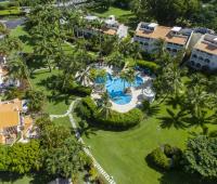 Another aerial view of Sugar Hill Resort, highlighting the resort’s luxurious villas, extensive gardens, and central pool area, capturing the serene atmosphere of this exclusive Barbados property.