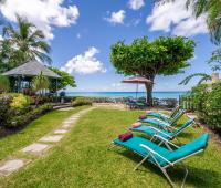 Barbados Beachfront Vacation Rental Villa Seawards Garden with Sun Loungers