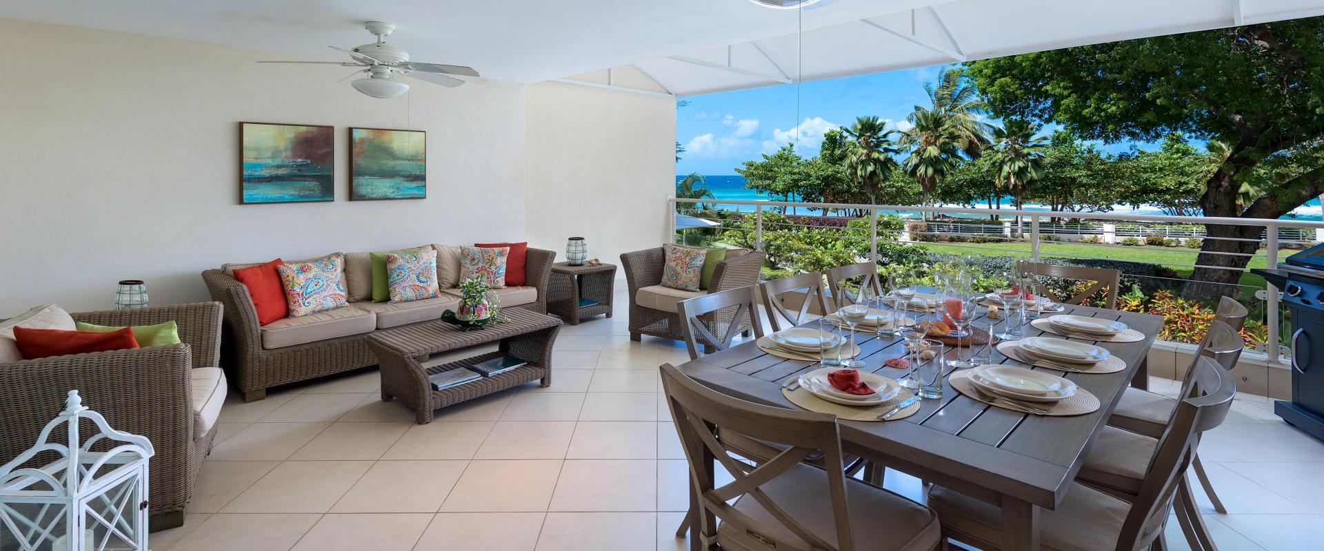 Palm Beach 204 Barbados Beachfront Condo Rental Covered Patio with Dining and Ocean View