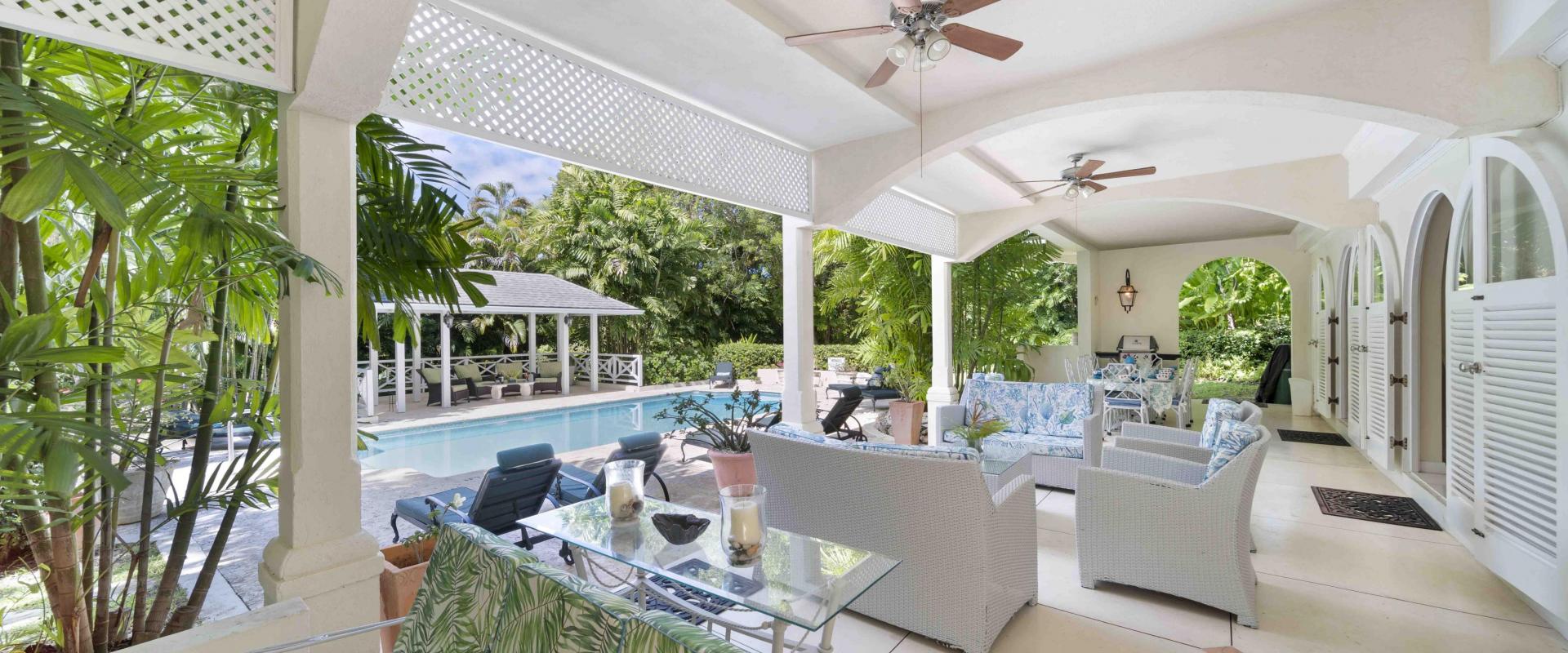 Dene Court Sandy Lane Barbados Covered Patio With Seating and Pool Deck View
