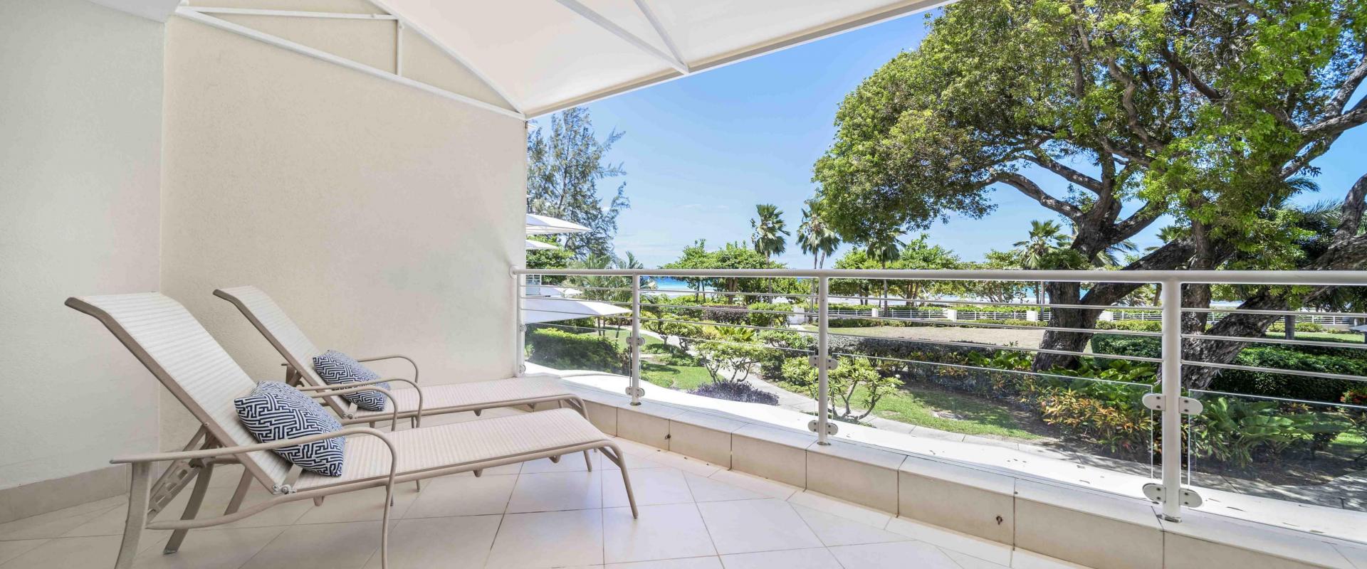 Palm Beach 204 Barbados Beachfront Condo Rental Sun Lounger On Patio