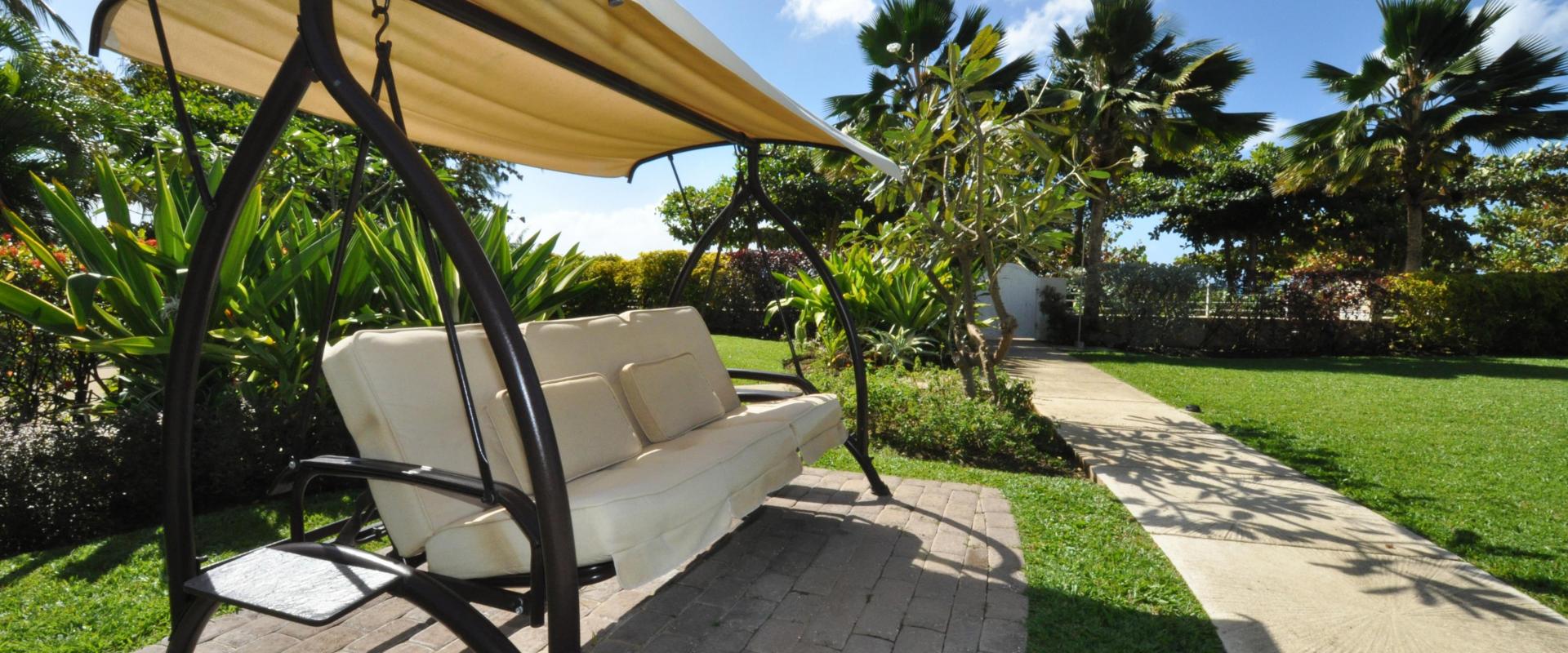 Palm Beach 211 Barbados Beachfront Vacation Condo Rental Seating in Gardens