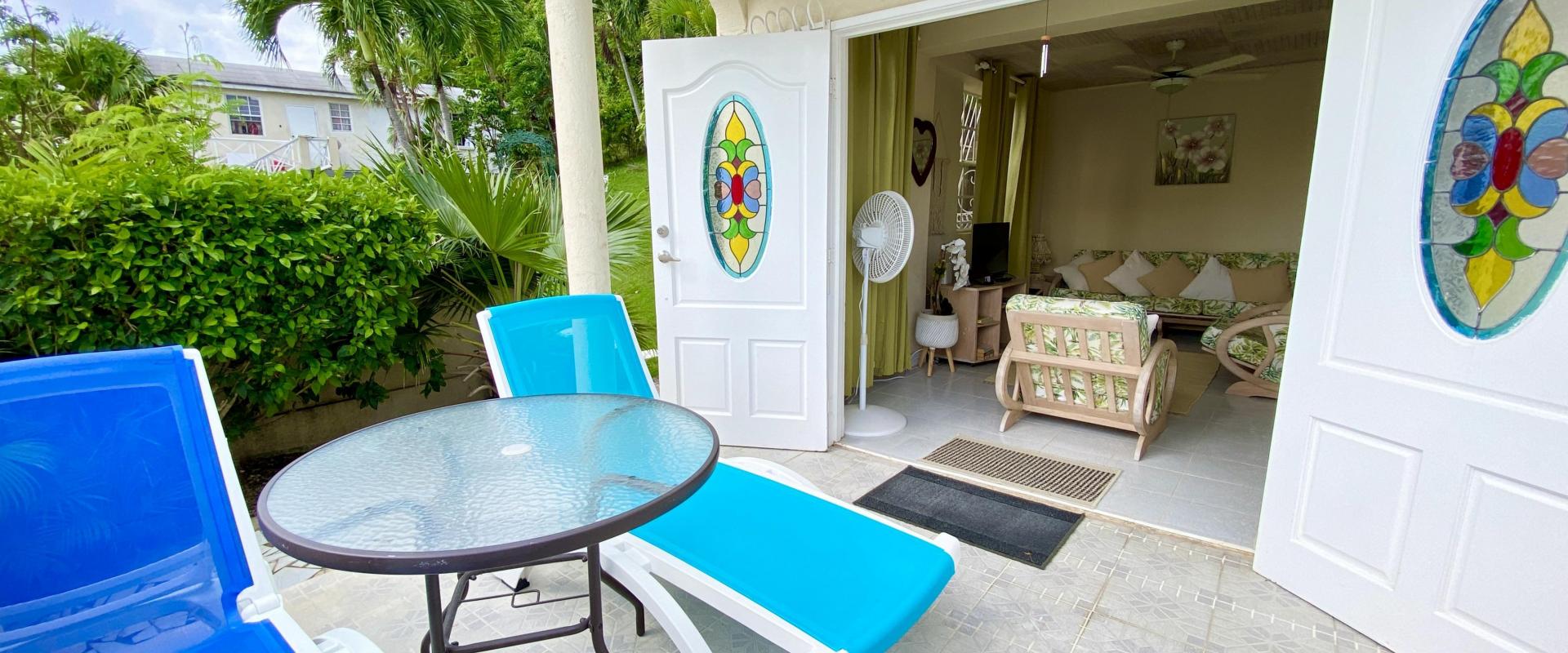 Heywoods 145 Barbados Vacation Rental Apartment Outside Patio with Lounge Chairs
