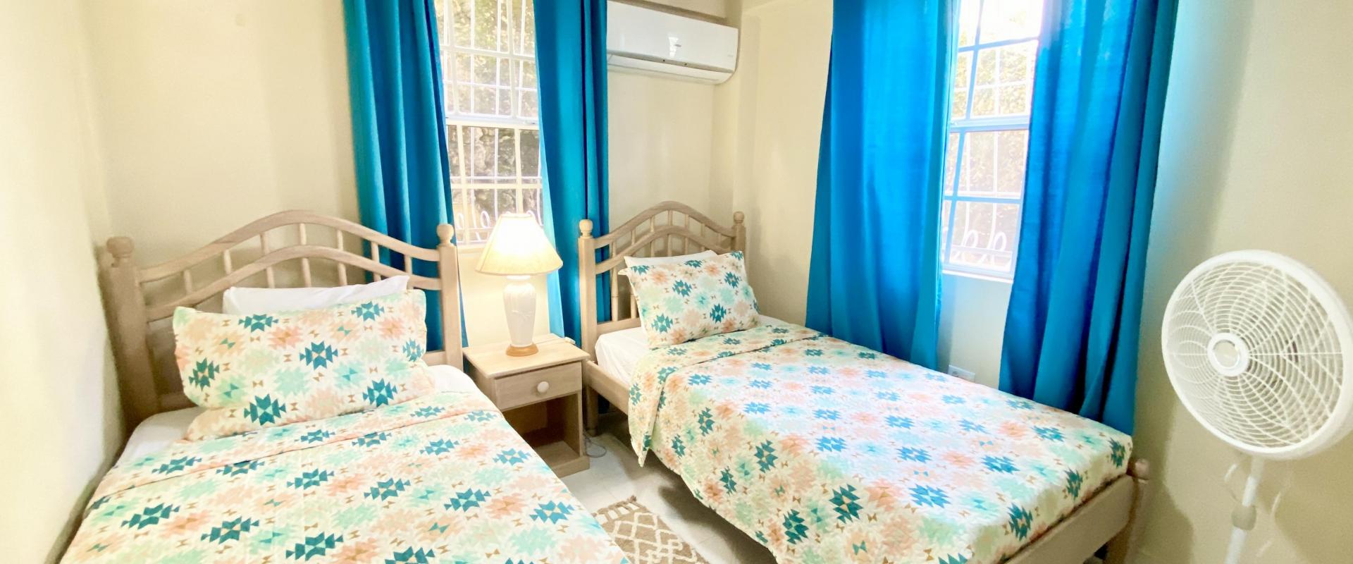 Heywoods 145 Barbados Vacation Rental Apartment Bedroom 2 with 2 Single Beds