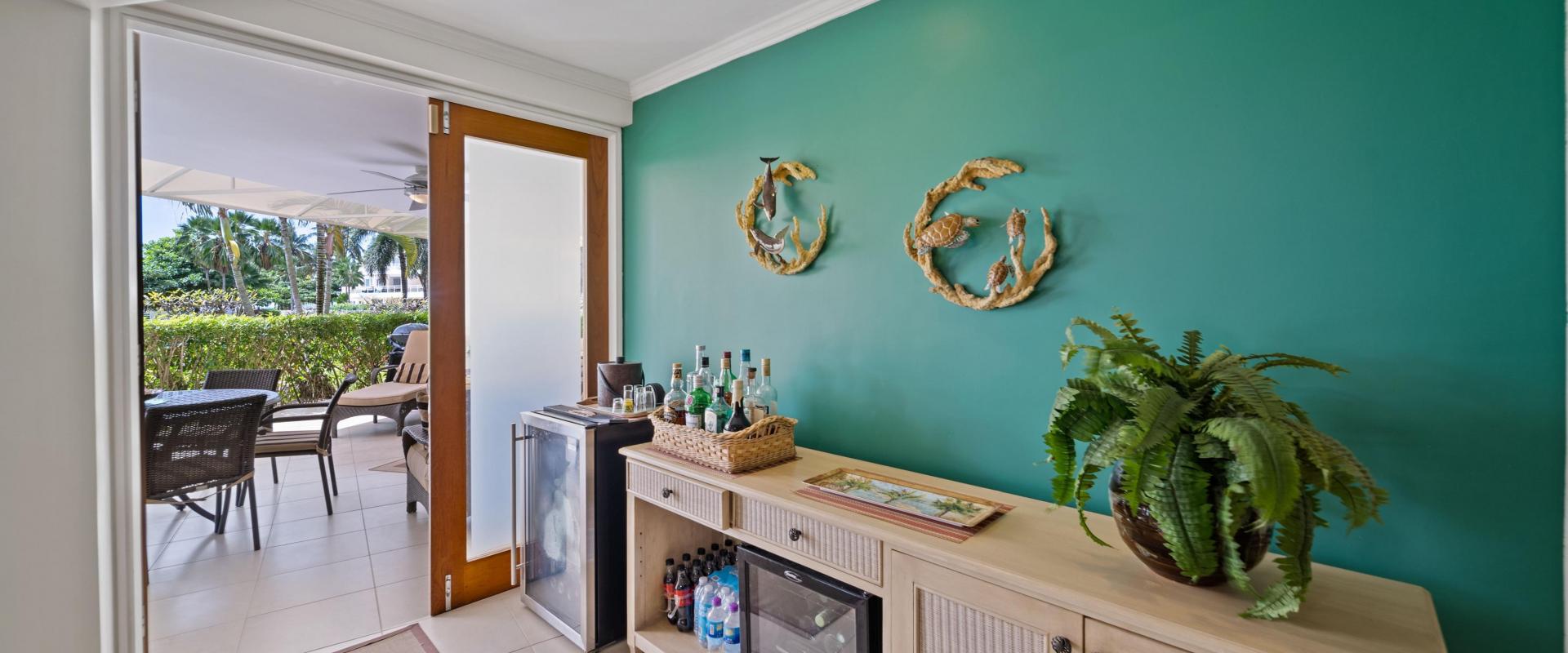 Palm Beach 102 Bar Area – Barbados Holiday Rental Bar area at Palm Beach 102 Barbados with patio access and indoor outdoor living layout