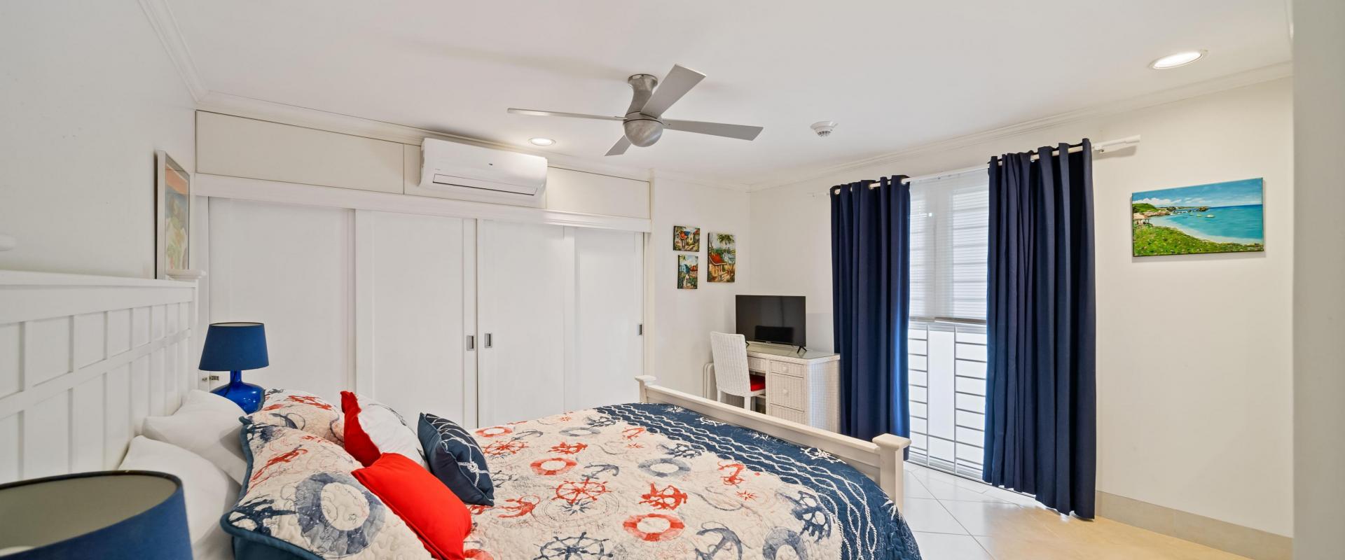 Palm Beach 102 Second Bedroom – Barbados Condo Rental Second bedroom at Palm Beach 102 Barbados holiday condo with air conditioning and comfortable furnishings