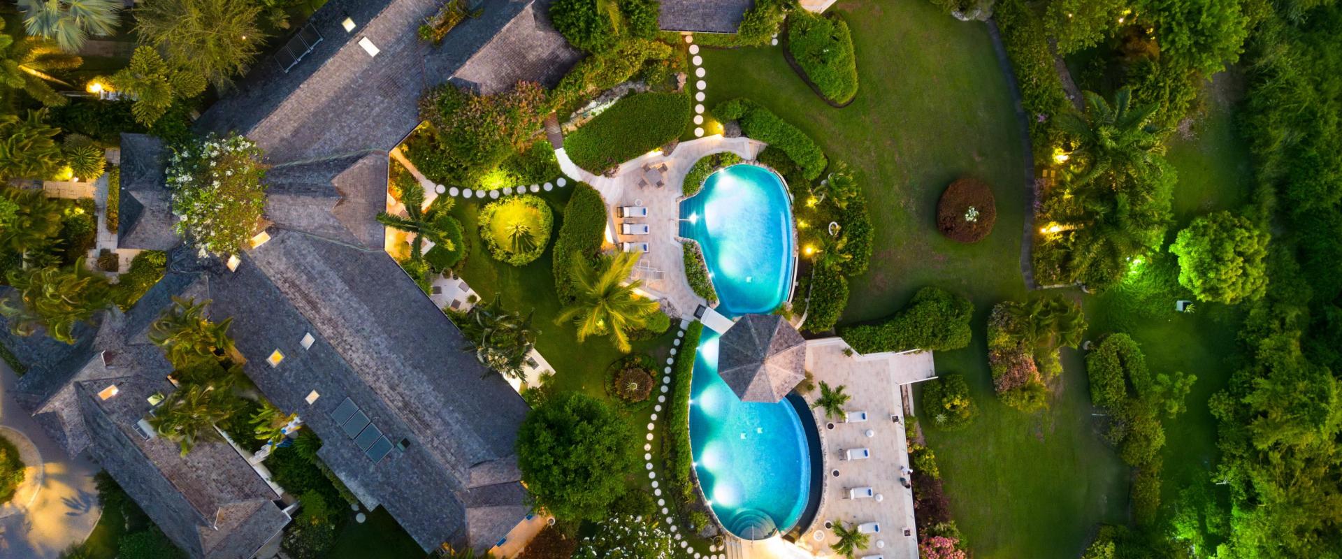 Point of View Holiday Rental In Sandy Lane Barbados Aerial View of Entire Property with Gardens at Dusk