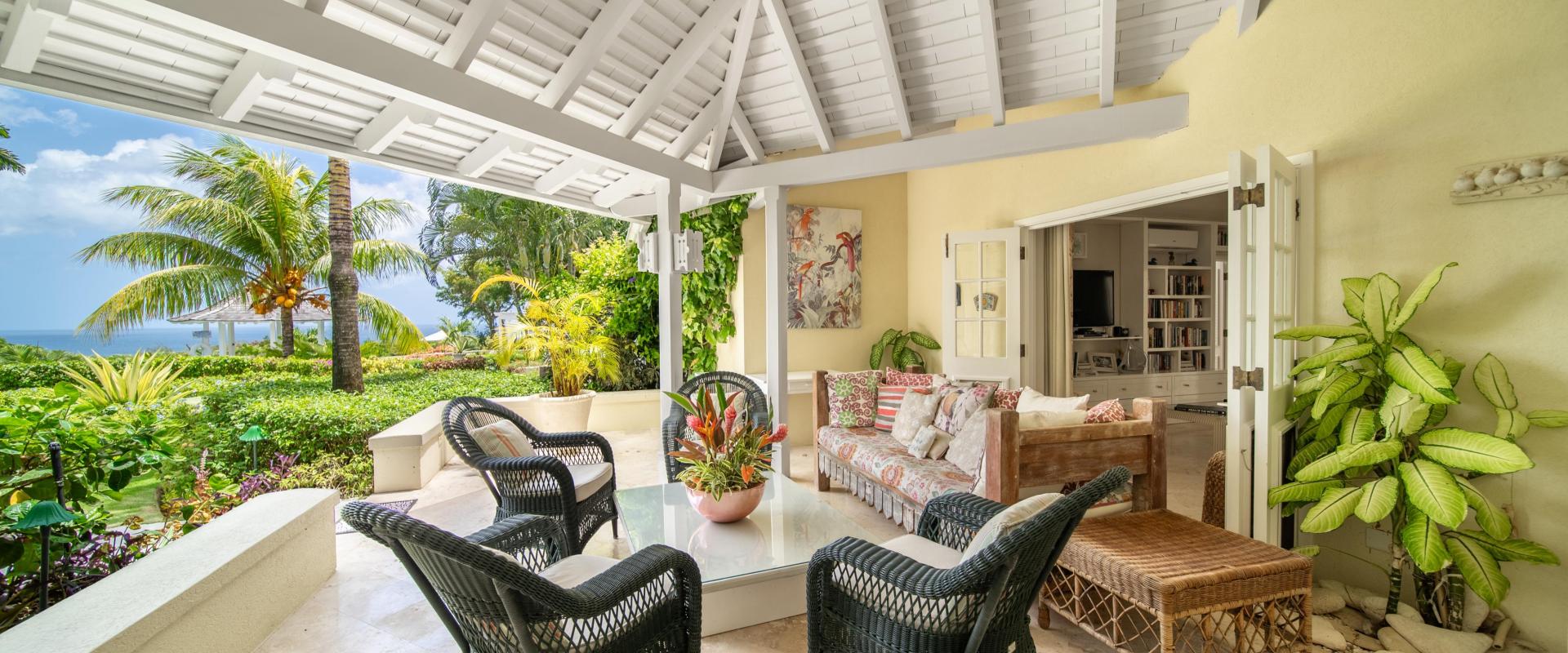 Point of View Holiday Rental In Sandy Lane Barbados TV Room covered Patio with Ocean and Garden Views