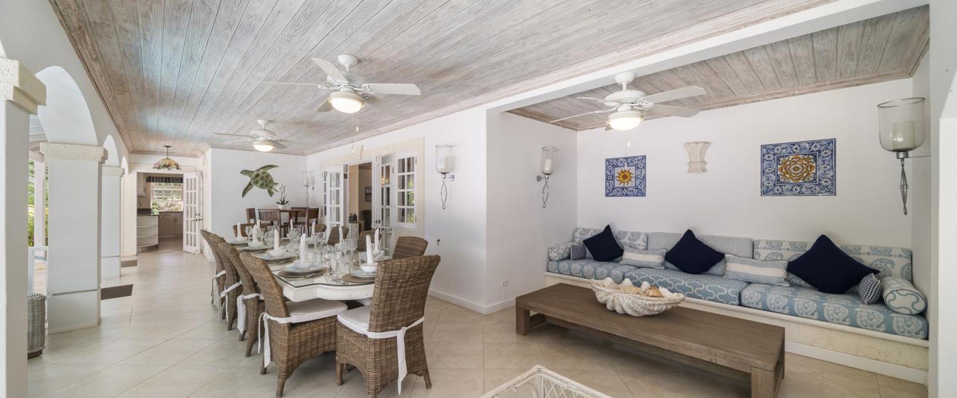 Spacious outdoor lounge and dining area at Sandalwood House, perfect for entertaining and relaxing in Barbados.