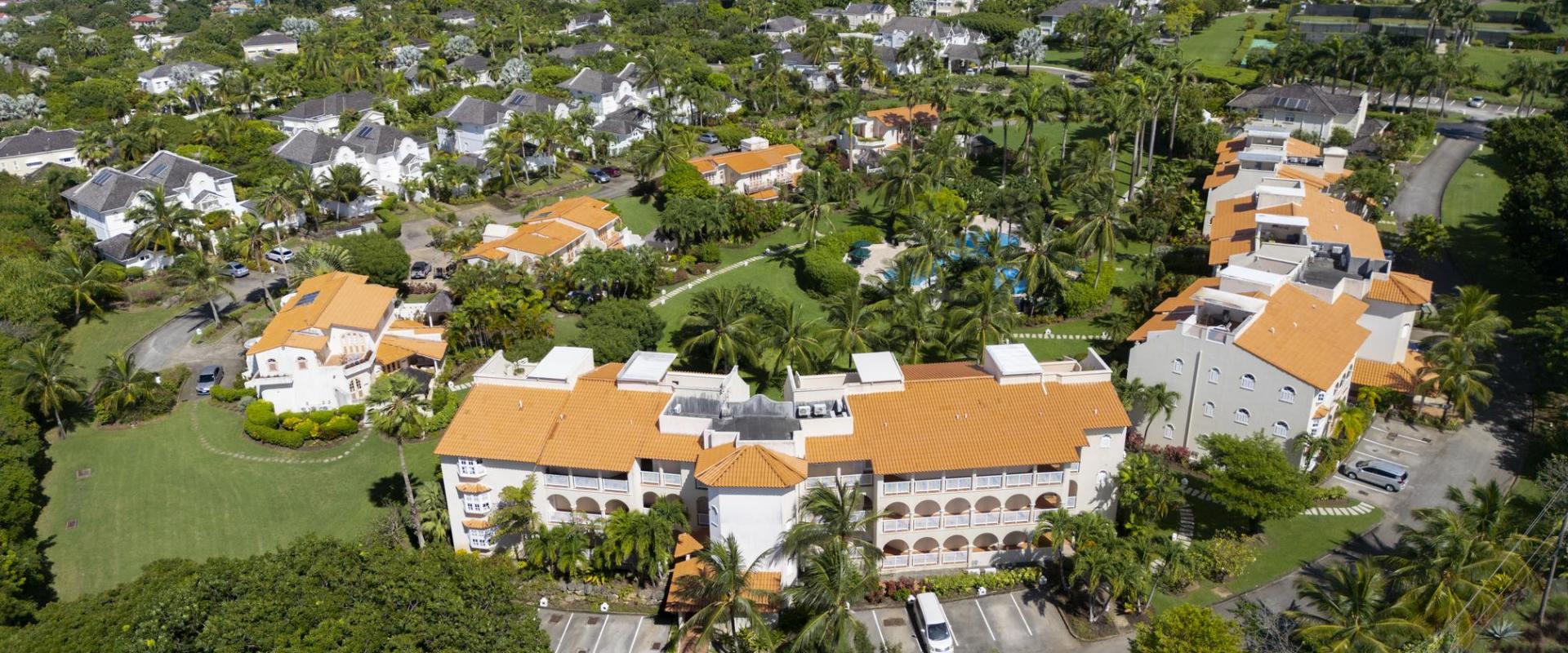 Elevated view of Sugar Hill Resort, Barbados, capturing the penthouse’s proximity to the coast, the resort’s tropical gardens, and the exclusive community, creating a perfect blend of luxury and natural beauty.