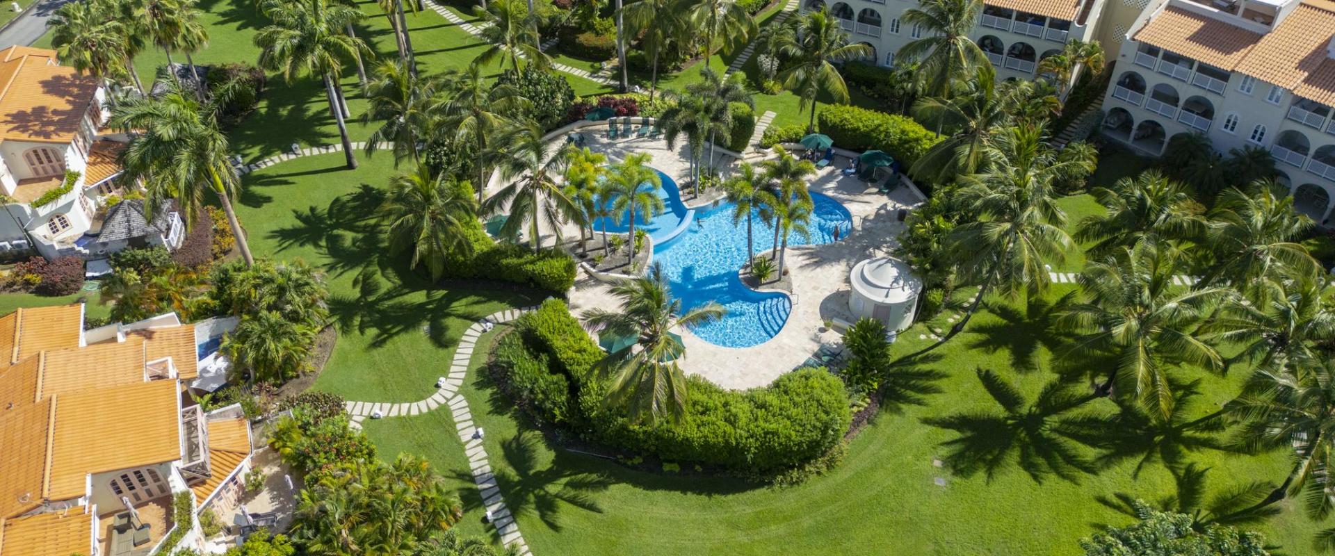 Another aerial view of Sugar Hill Resort, highlighting the resort’s luxurious villas, extensive gardens, and central pool area, capturing the serene atmosphere of this exclusive Barbados property.