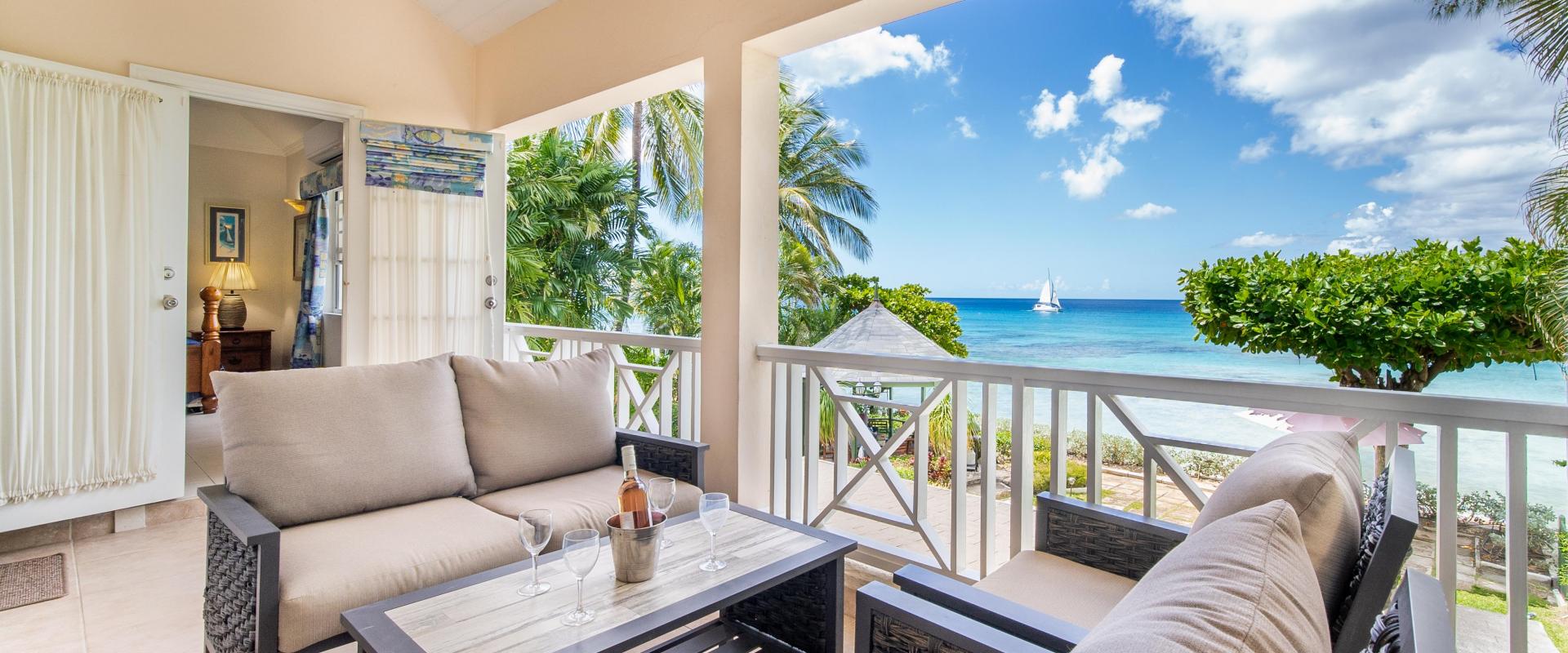 Barbados Beachfront Vacation Rental Villa Seawards Master Bedroom Patio with Seating