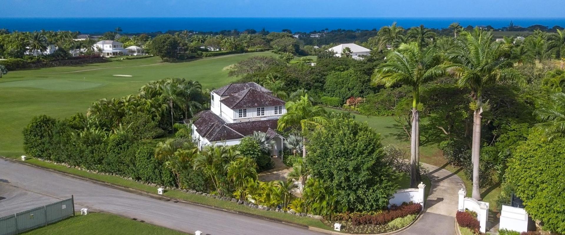 Aerial view of Villa Rosa, showcasing the villa’s prime location within Royal Westmoreland with ocean views.