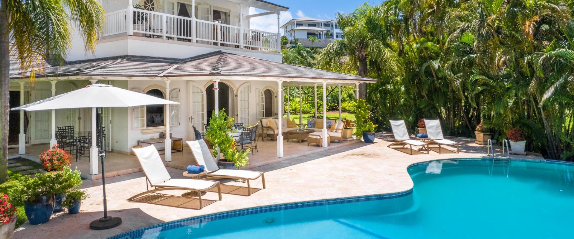 Villa Rosa’s private pool and sun loungers, offering a tranquil Caribbean getaway in Barbados.