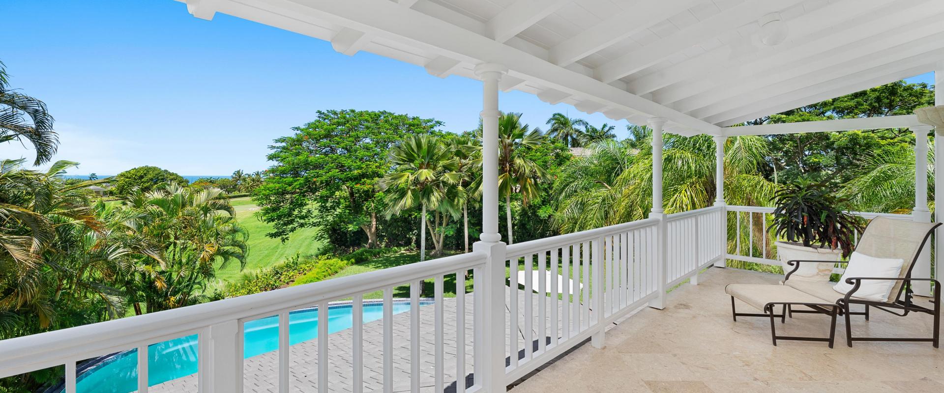 Villa Rosa Holiday Rental Villa In Royal Westmoreland Barbados Master Bedroom Patio with Pool and Golf Course View